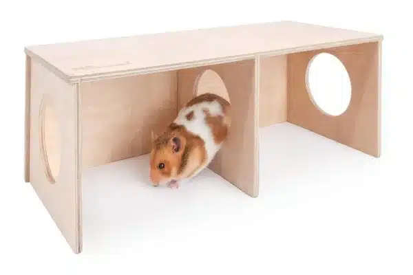 Niteangel wooden hamster hide with two chambers and a Syrian hamster climbing through the center